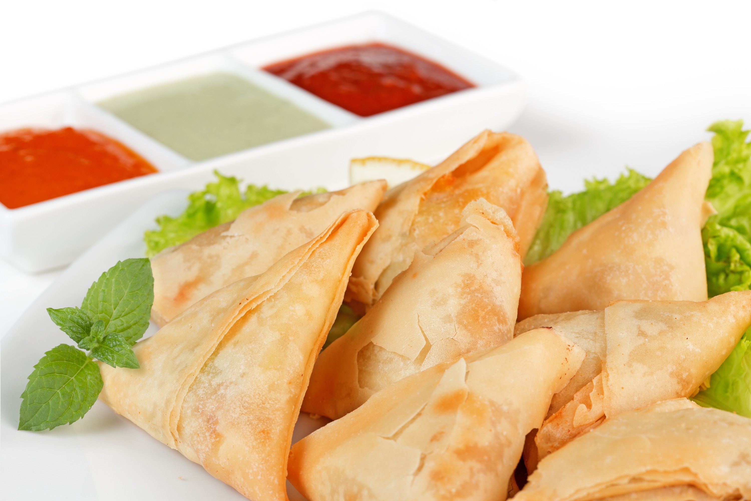Indian Samosas Served With Trio of dipping Sauces